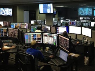 Group of people in control room